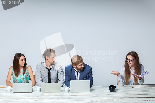 Image of Business team working on their business project together at office