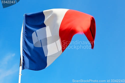 Image of french waving flag in the blue sky  france  wave