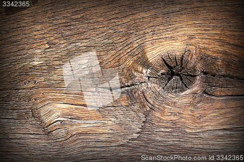 Image of knot on ancient wood plank 