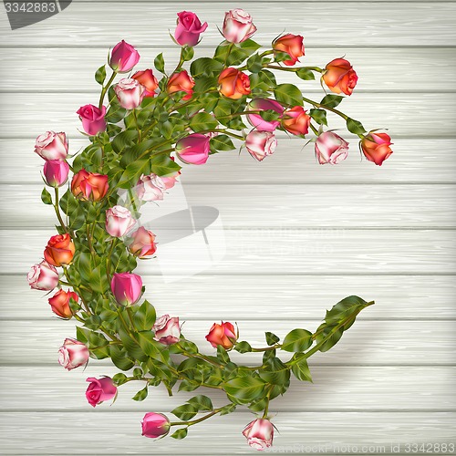 Image of Roses on wooden background. EPS 10