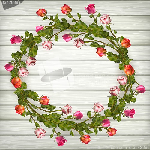 Image of Roses wreath on wooden background. EPS 10