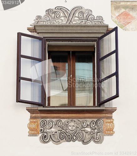 Image of Window of old house in Ljubljana, Slovenia, with murals