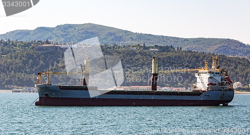 Image of Cargo Ship Sailing in Ocean