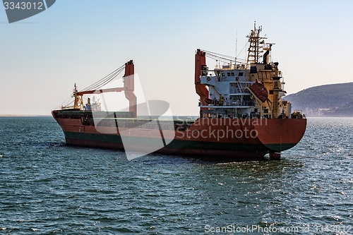 Image of Cargo Ship Sailing in Ocean