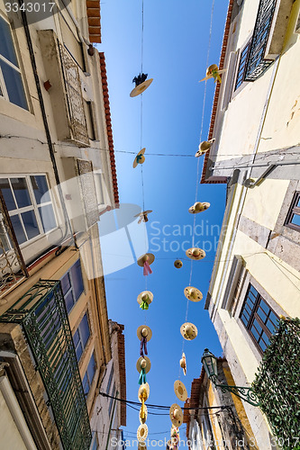 Image of City Streets Decorated with Straw Hats