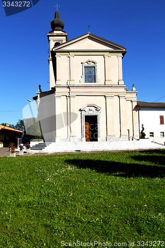 Image of in  the cardano al campo  old    tower sidewalk italy  lombardy 