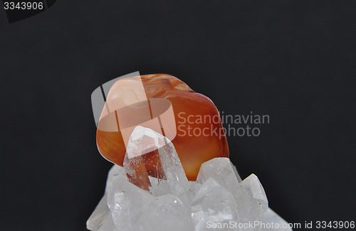 Image of Carnelian on rock crystal