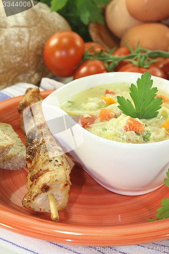 Image of Chicken soup with tomatoes
