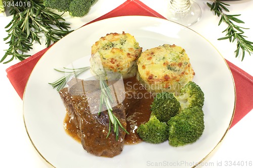 Image of Venison medallions with potato gratin