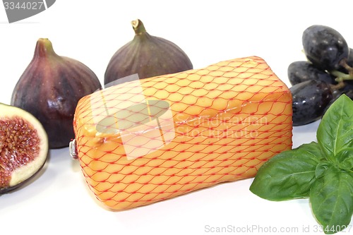Image of Piece of cheese with figs