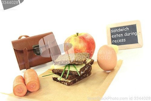 Image of sandwich eaten during break with apple