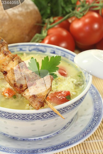 Image of Asian Chicken soup with greens