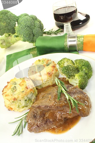 Image of Venison medallions with potato gratin and rosemary