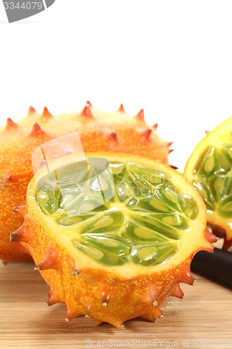 Image of horned melon on a wooden board