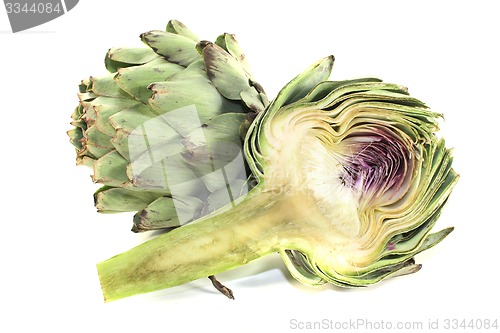 Image of sliced and whole artichokes