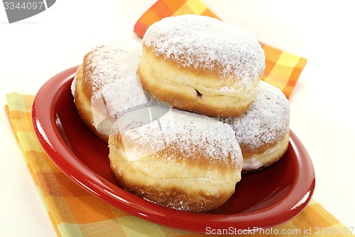Image of Pancakes with powdered sugar and jam