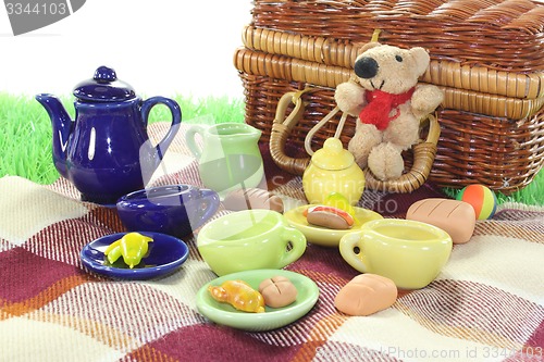 Image of picnic with wicker basket