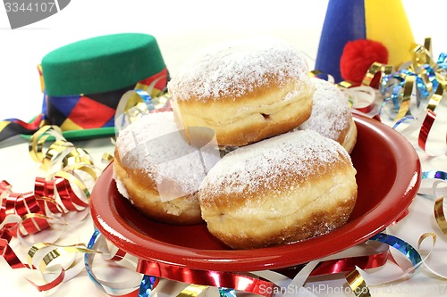 Image of Pancakes with streamers and carnival hats