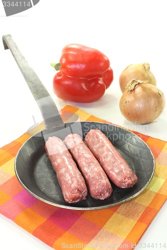 Image of Salsiccia with vegetales in a pan