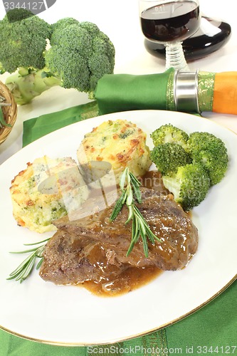 Image of Venison medallions with rosemary branch