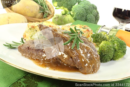 Image of Venison medallions with gratin potatoes