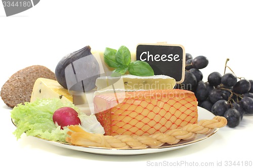 Image of Pieces of cheese with blackboard
