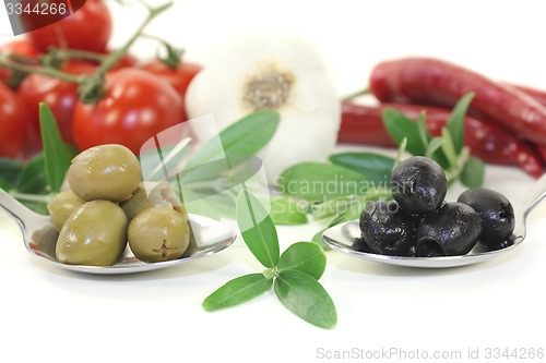 Image of olives with olive twig