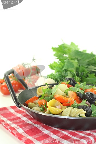 Image of freshly cooked Pasta pan with ham strips