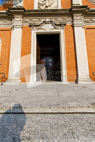 Image of door   in italy  lombardy   column  sky