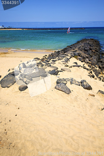 Image of white coast lanzarote  in spain   beach  windsurf