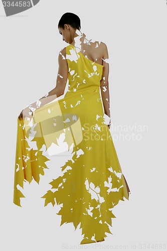 Image of double exposure of woman and tree