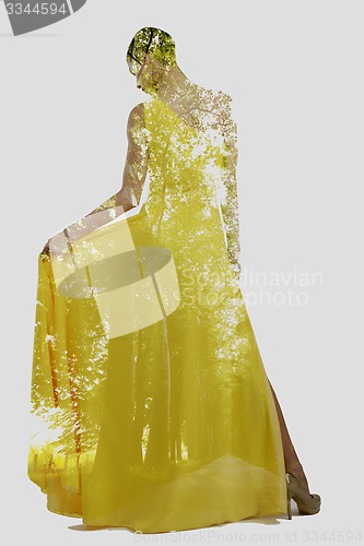 Image of double exposure of woman and tree
