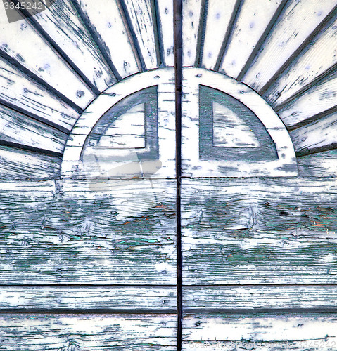 Image of abstract sumirago cross   brass brown knocker in a   closed  