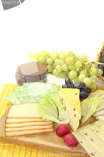 Image of Slices of cheese with radishes