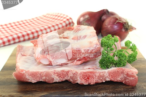 Image of Beef spare ribs with parsley and onions