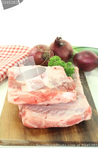 Image of Beef spare ribs on a wooden board