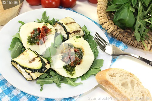 Image of Courgette rolls and filled mozzarella with arugula