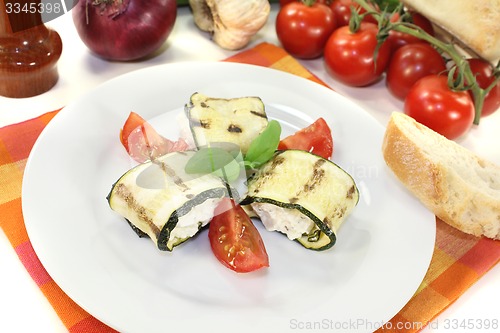 Image of stuffed courgette rolls