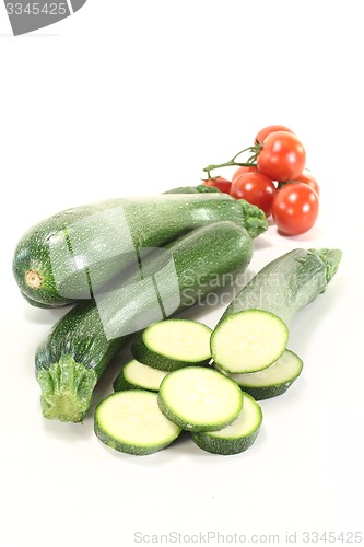 Image of zucchini with red tomatoes
