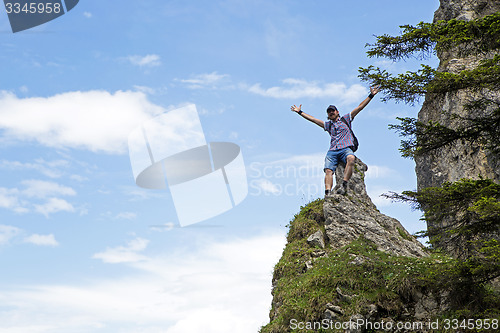 Image of Hiker on mountain top