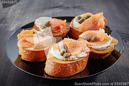 Image of toasted bread with salmon and cream cheese