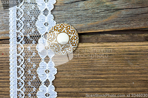 Image of vintage button and lace tape