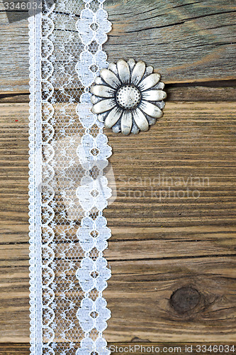 Image of vintage button flower  and lace tape