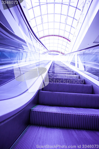 Image of blue steps of escalator
