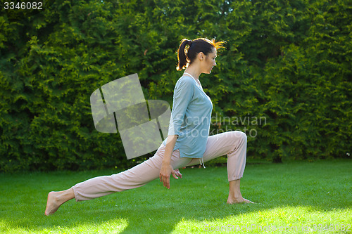 Image of adult woman doing yoga