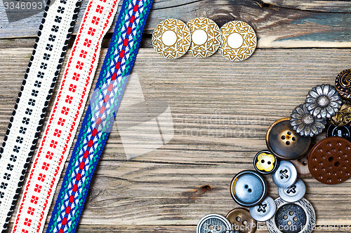 Image of vintage buttons and ancient ribbons