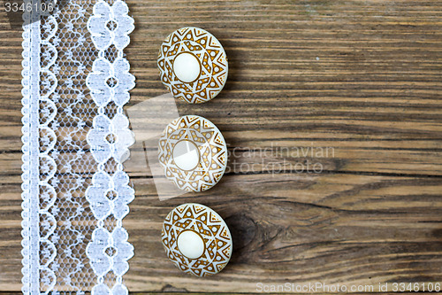 Image of vintage button and lace tape