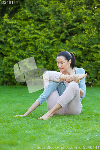 Image of adult woman doing yoga