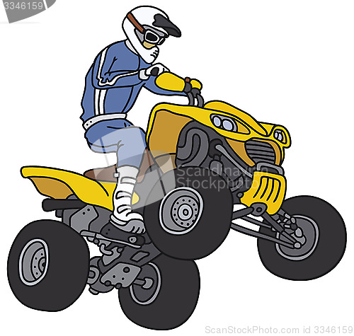 Image of Rider on the yellow ATV