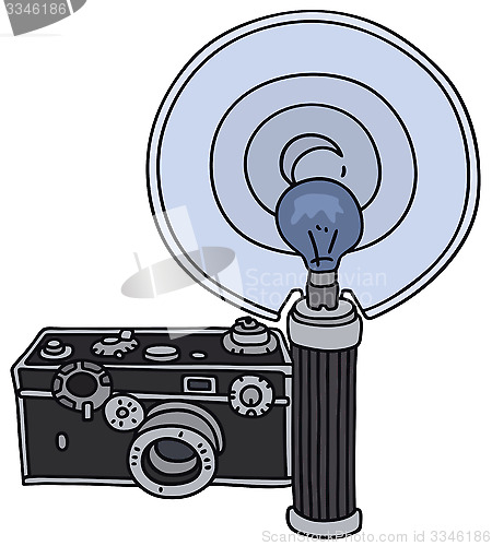 Image of Retro camera with a flashlight